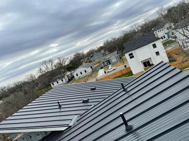 Standing seam metal roof panels with vents for Skylight Repair in Plattsburgh